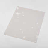 cartoon style white stars on tan background Removable Peel and Stick Wallpaper sample size