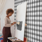 White background black crosshatch pattern wallpaper in room with artist peel and stick removable
