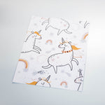 cartoon style white and orange unicorn and rainbow design pattern on white background peel and stick wallpaper sample size