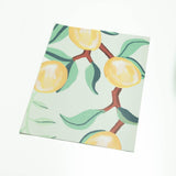 illustrated green leaves yellow lemon on mint green background wallpaper peel and stick pattern sample size