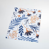 blue and orange leaves and flowers pattern on light blue background Removable Peel and Stick Wallpaper sample size