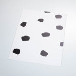 charcoal spots design pattern on white background Removable Peel and Stick Wallpaper sample size